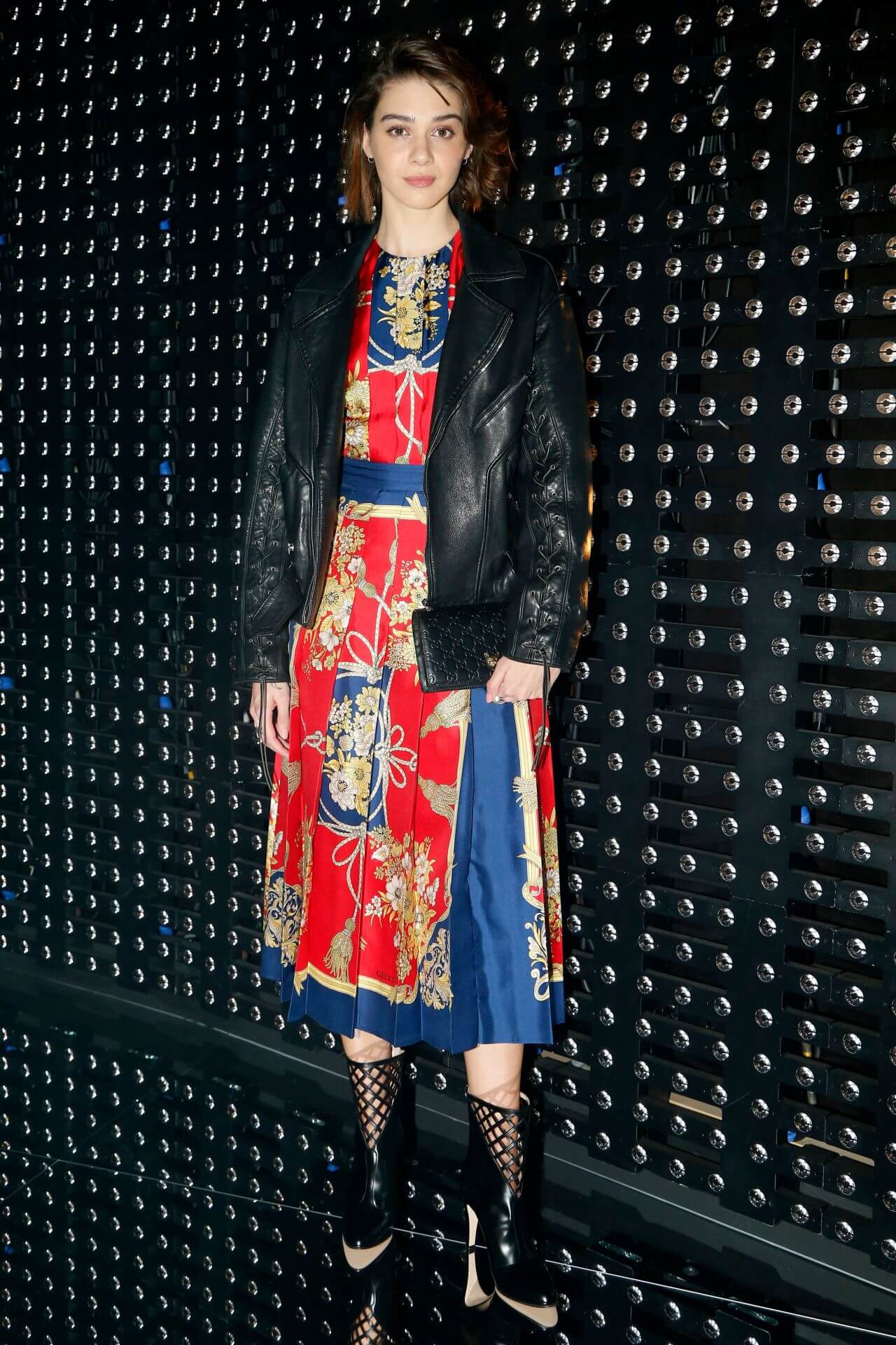 Emma Appleton In Printed Long Dress With Leather Jacket