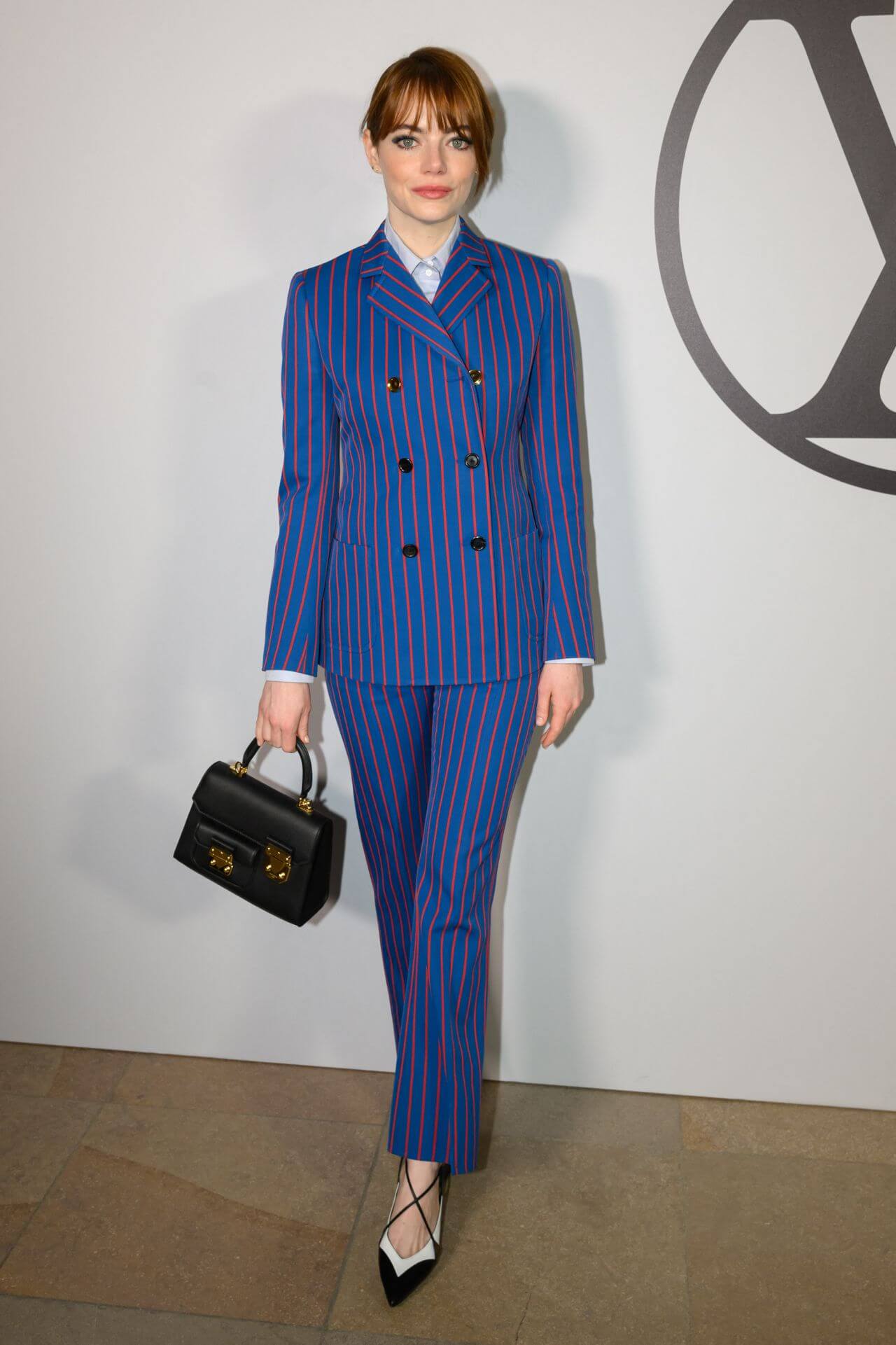 Emma Stone In Blue Striped Pantsuit