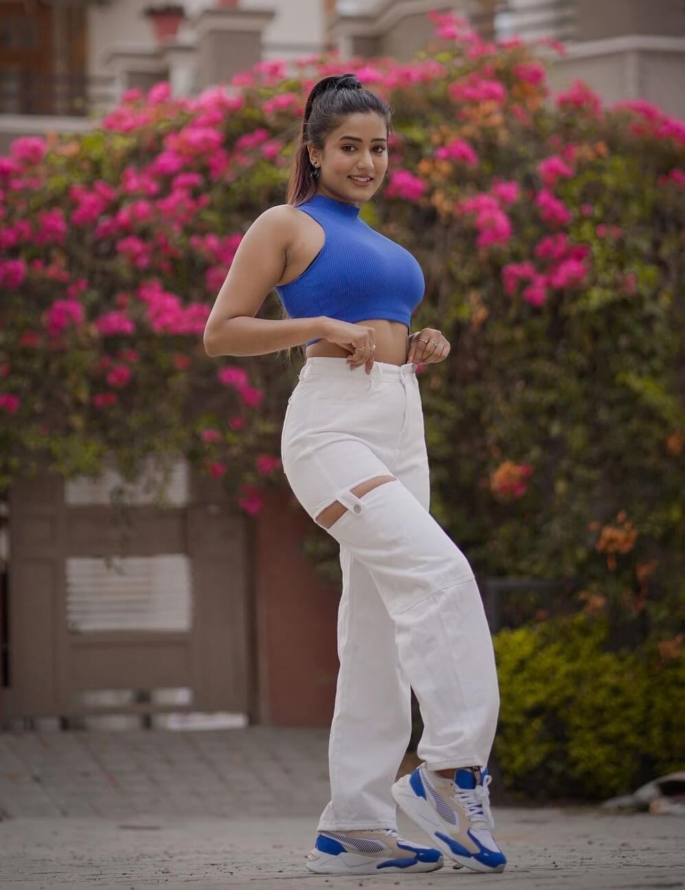 Garima Chaurasia In a Blue Crop Top With White Bottoms