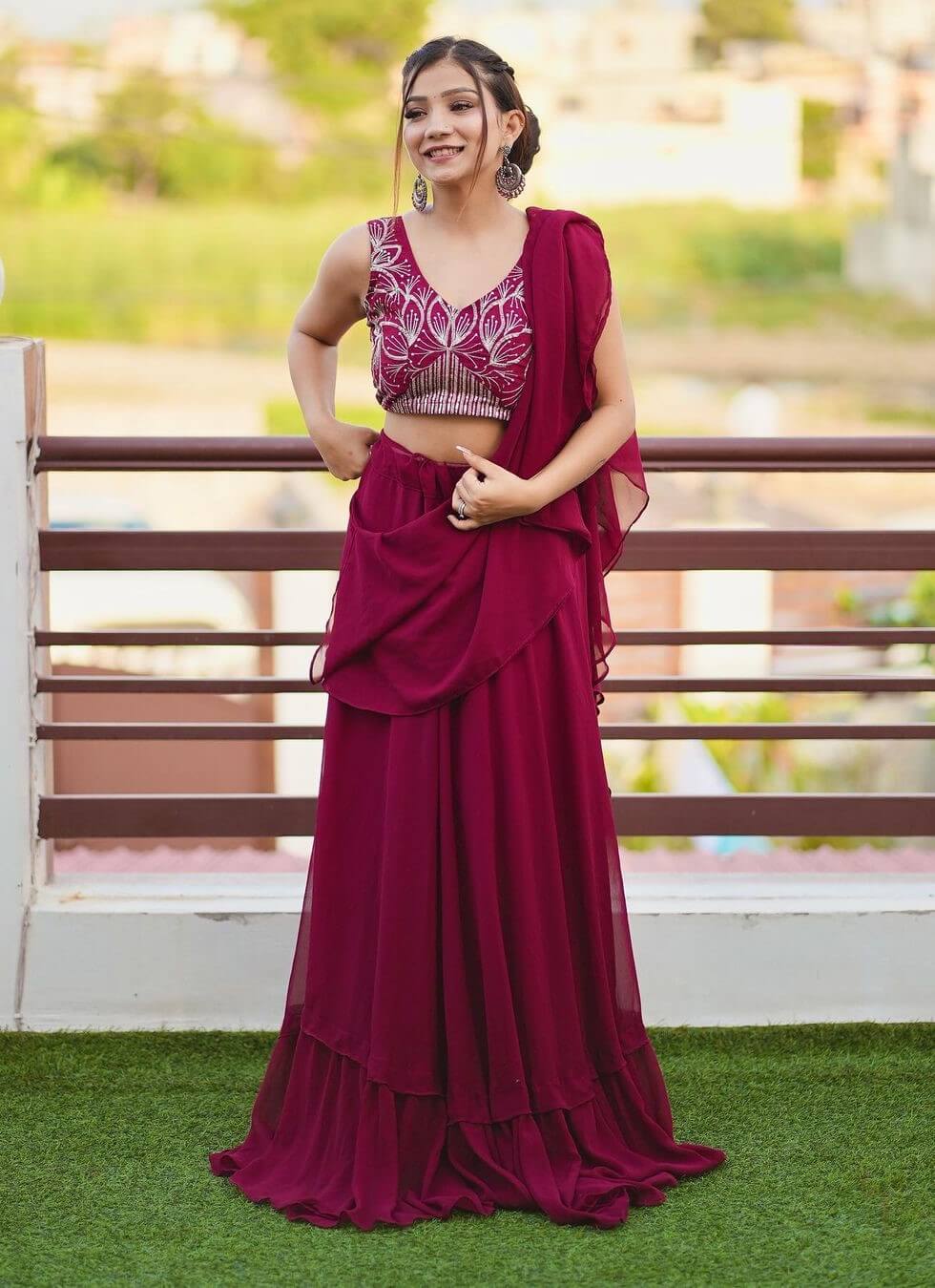 Khushi Punjaban In Maroon Ruffle Saree With Shimmery Blouse
