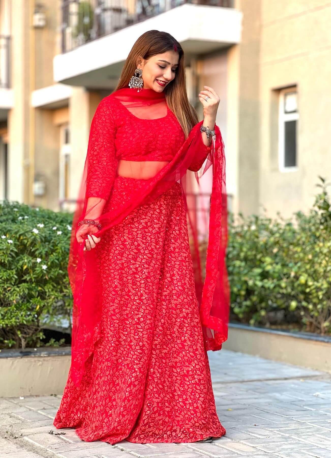 Khushi Punjaban  In Red Shimmery Lehenga set
