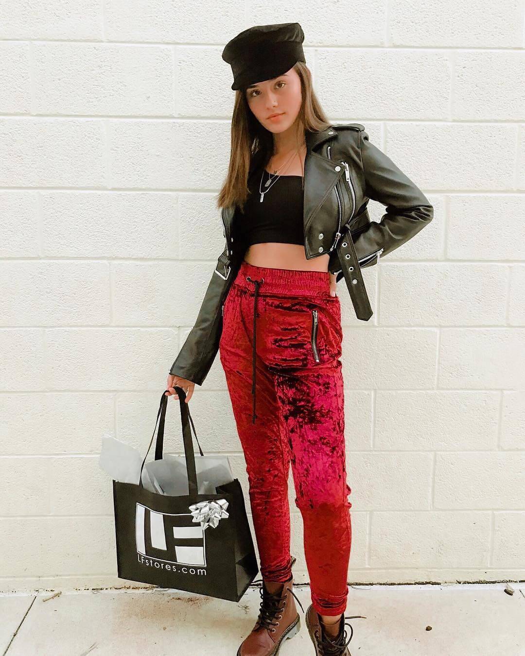 Makayla Storms In Black Crop Top and Velvet Trousers With Jacket