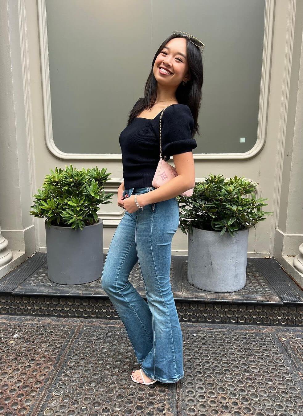 Nicole Laeno In Black Woven Top With Flare Denim Jeans