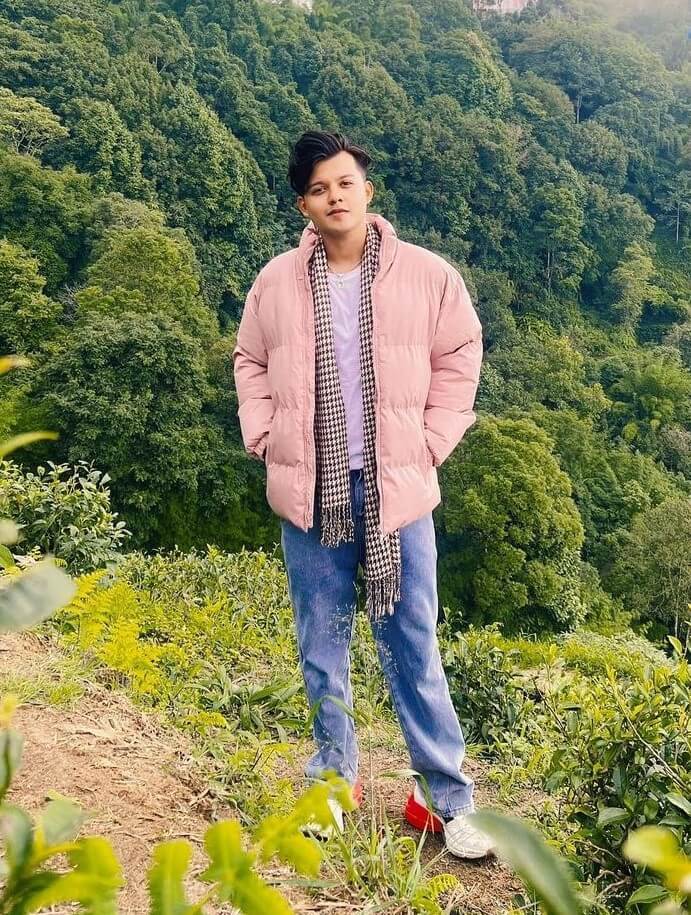 Riyaz Aly In a Dusky Pink Bomber Jacket With Denim Jeans