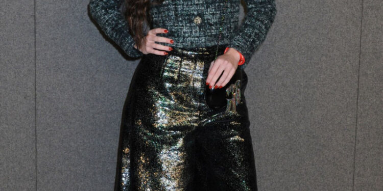 Hailey Gates in woven Top with Shimmery Flare Pants