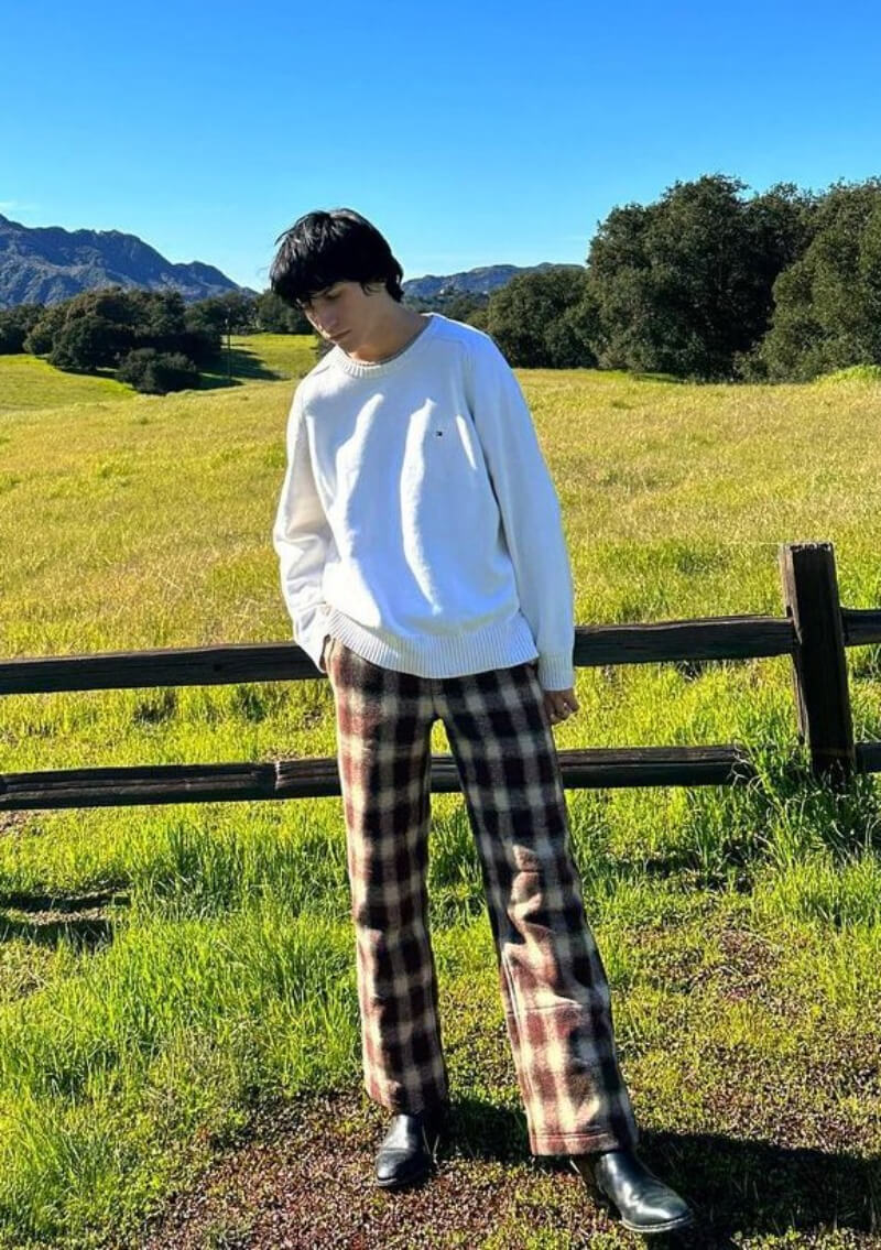 Chase Hudson In a White Pullover with Checked Pants