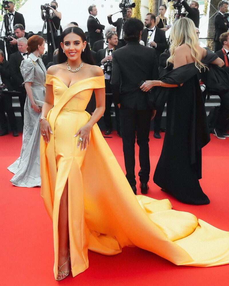 Hadia Ghaleb in Yellow Draping Style Long Flare Gown