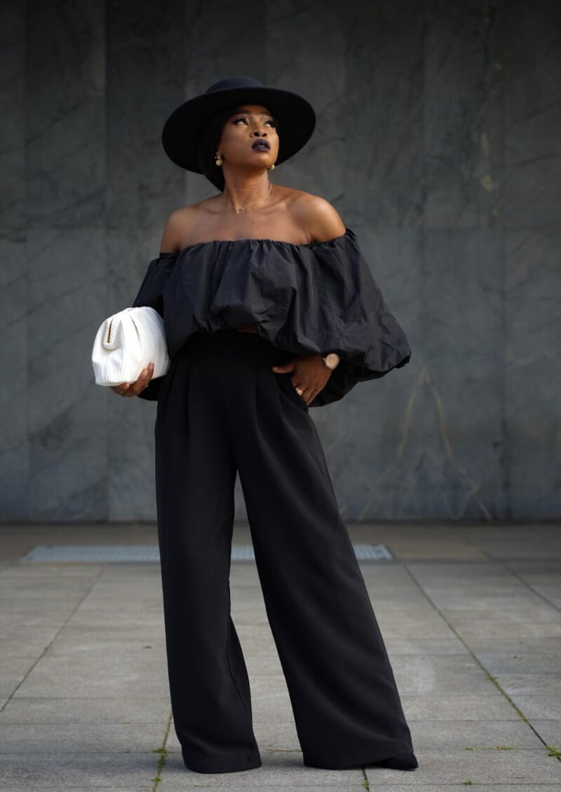 Lady-Nneka In Black Off-Shoulder Baggy Jumpsuit