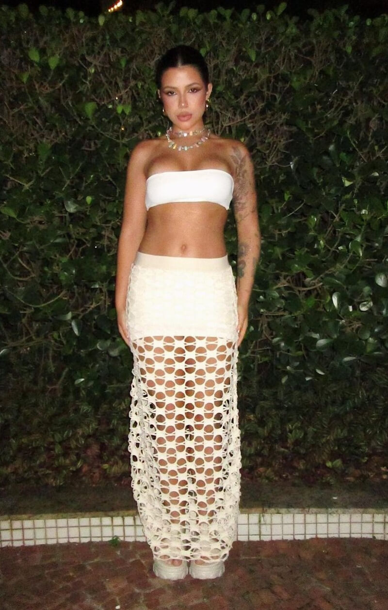 Luiza Parente In White Tube Top With Crochet Long Skirt