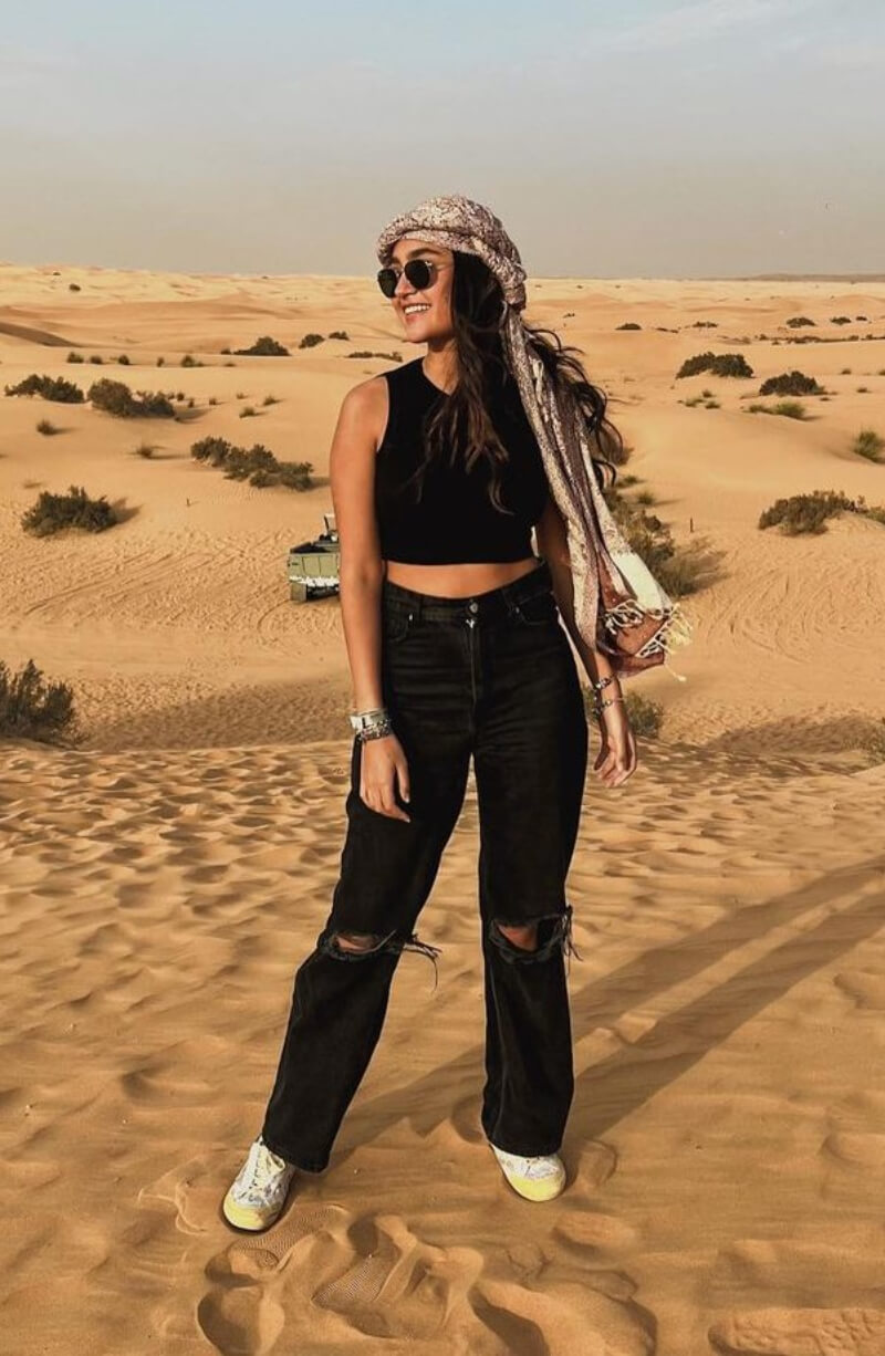 Xime Ponch In Black Crop Top With Jeans