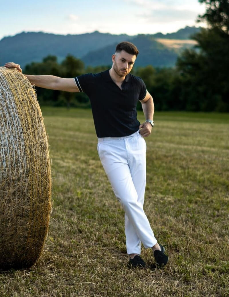 Alessandro Piacenti In Black T-shirt With White Pants