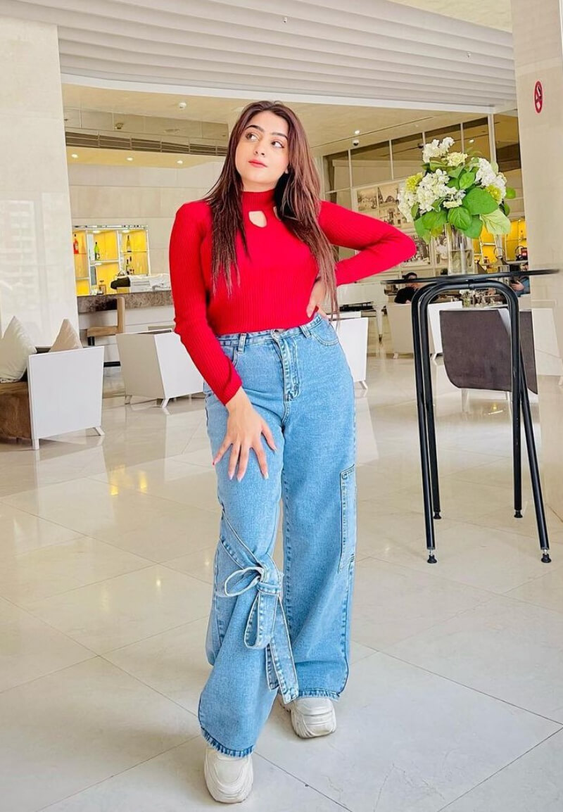 Arooj Fatimah In a Red Woven Top With Denim Bottoms