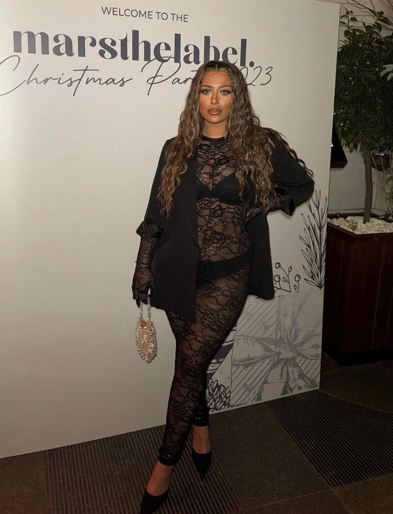 Bethan Kershaw in Black Lace Design Jumpsuit With Blazer