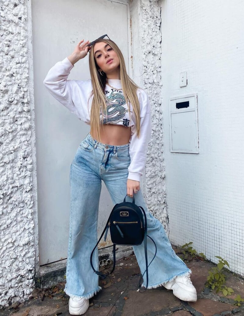 Brendha Crizel In White Sweatshirt With Flare Jeans