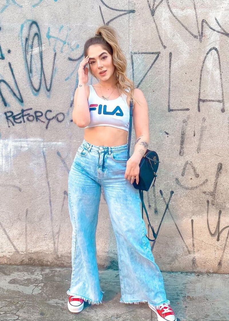 Brendha Crizel in White Tank Top With Flare Jeans