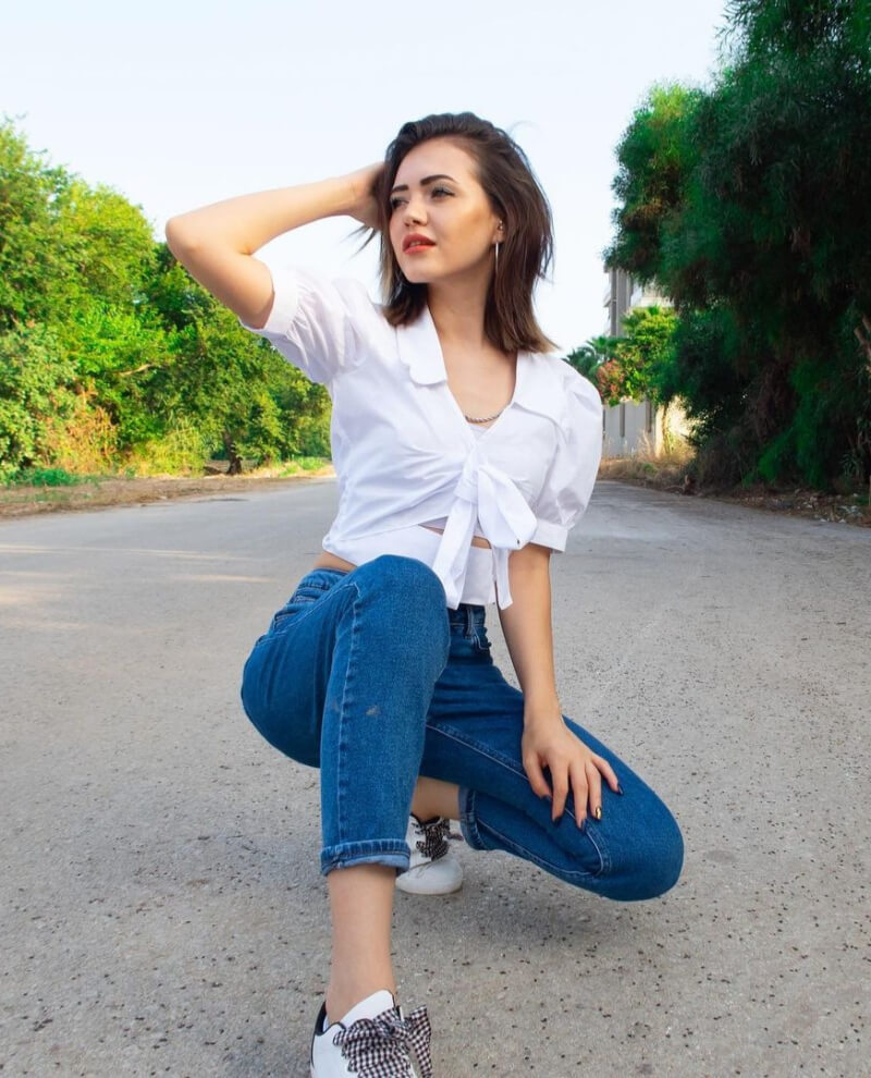 Kubrasal In White Top With Denim Jeans