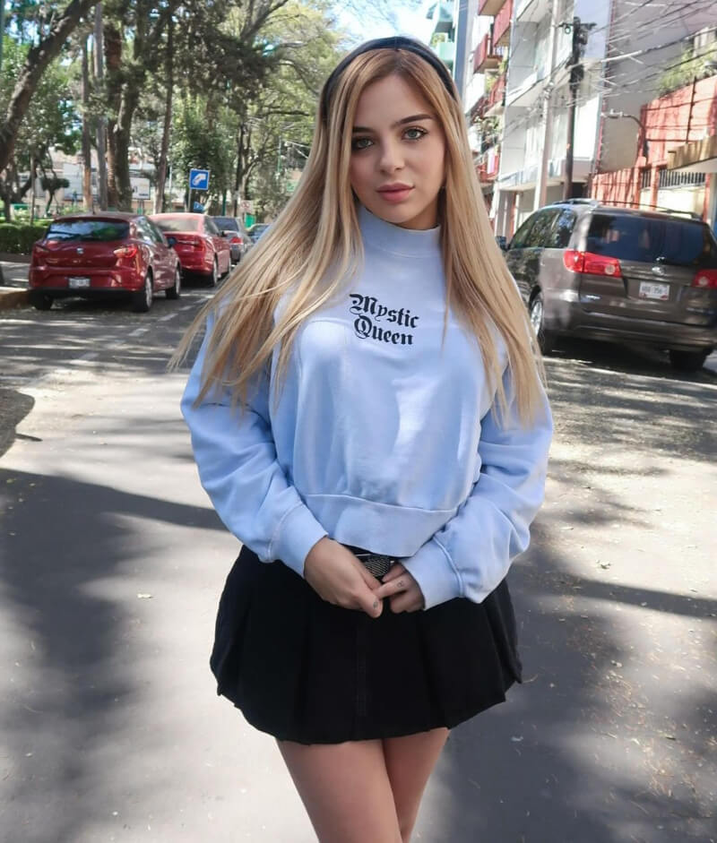 Laila Montero In Baggy Pullover With Mini Skirt
