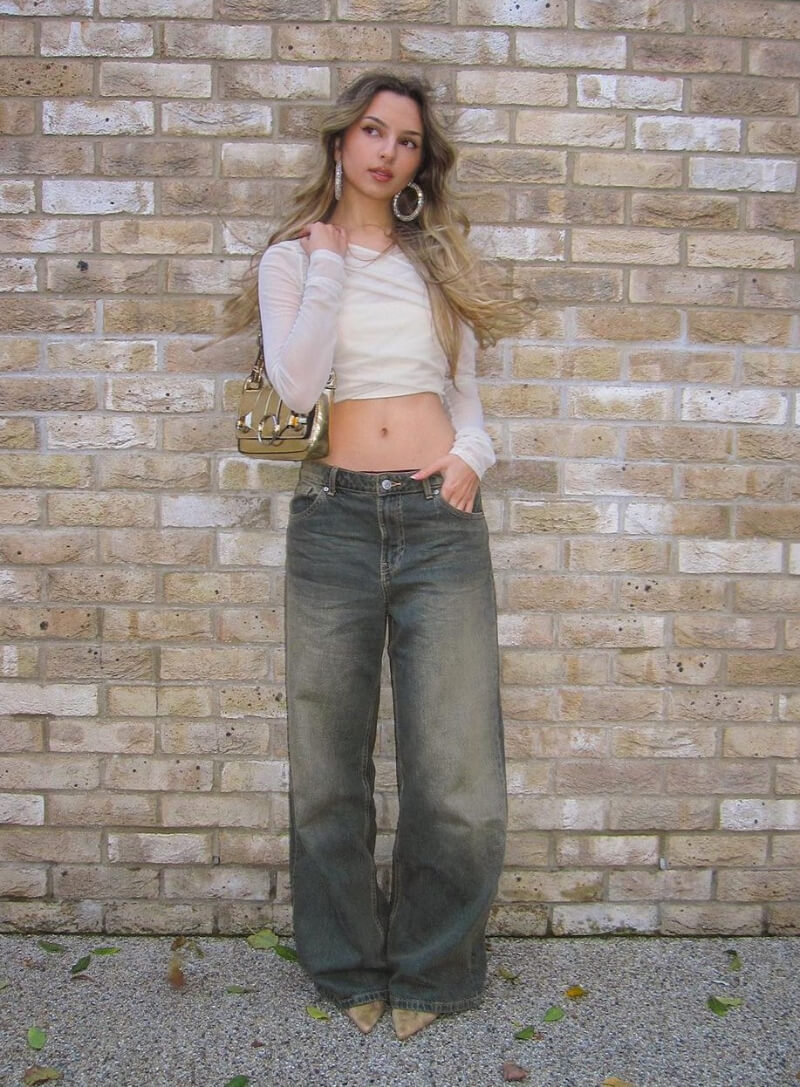 Luiza Cordery In White Crop Top With Baggy Jeans