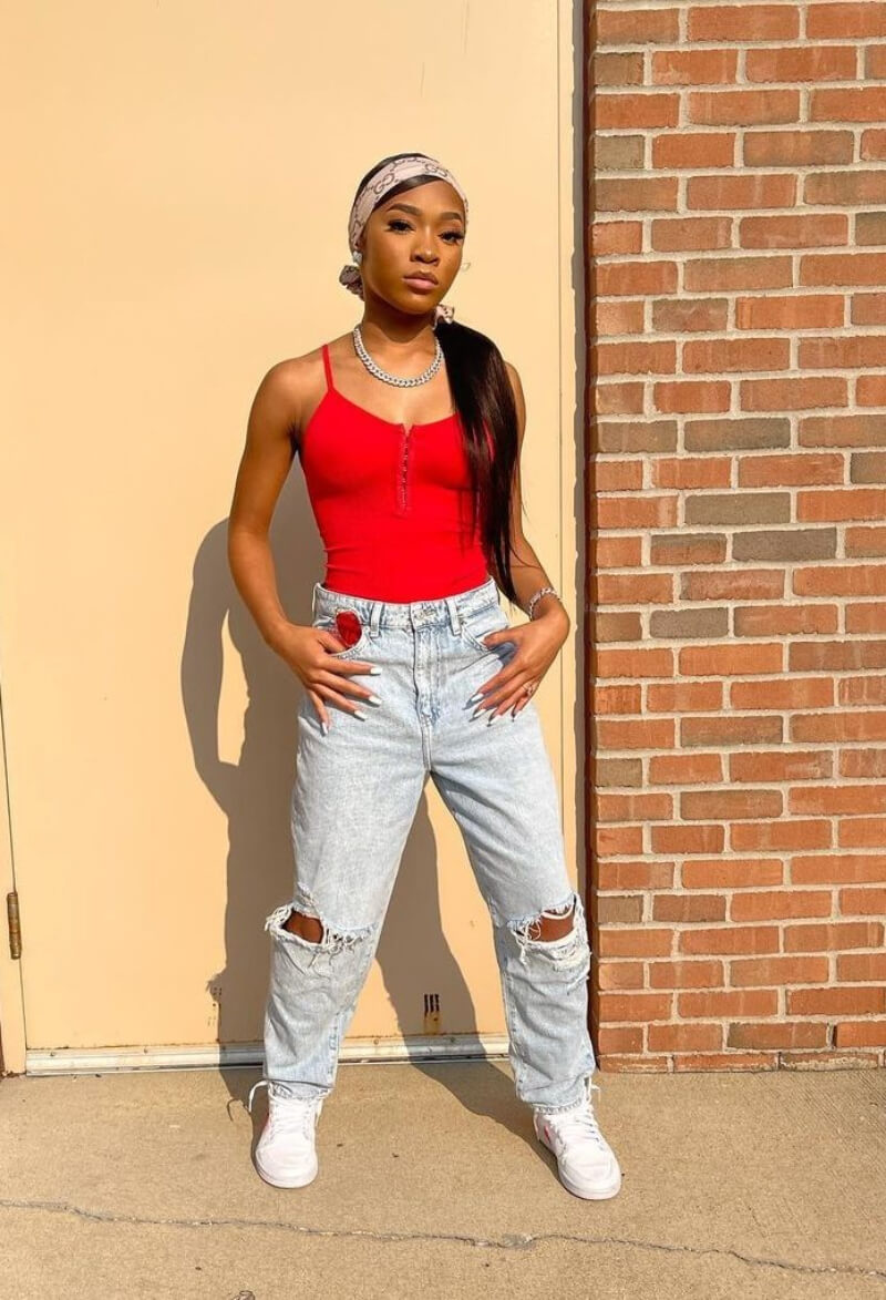 Mya Nicole In Red Cami Top With Ripped Jeans
