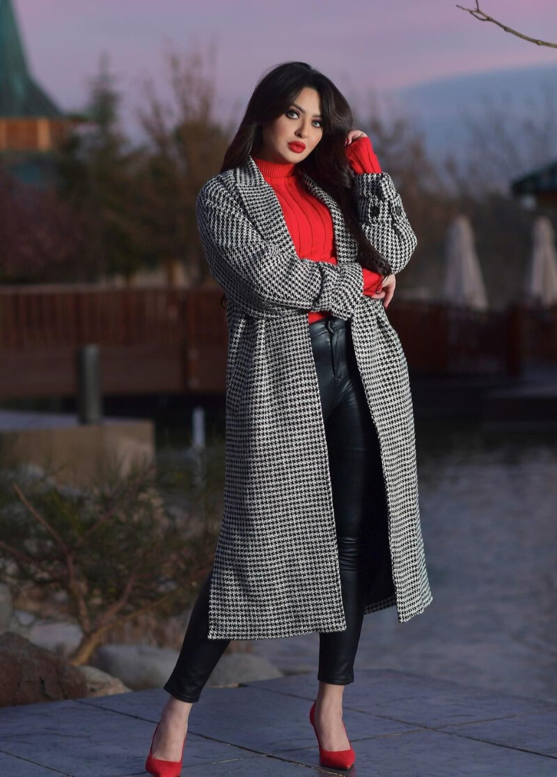 Oumi Amani In Checked Long Coat With Leather Pants