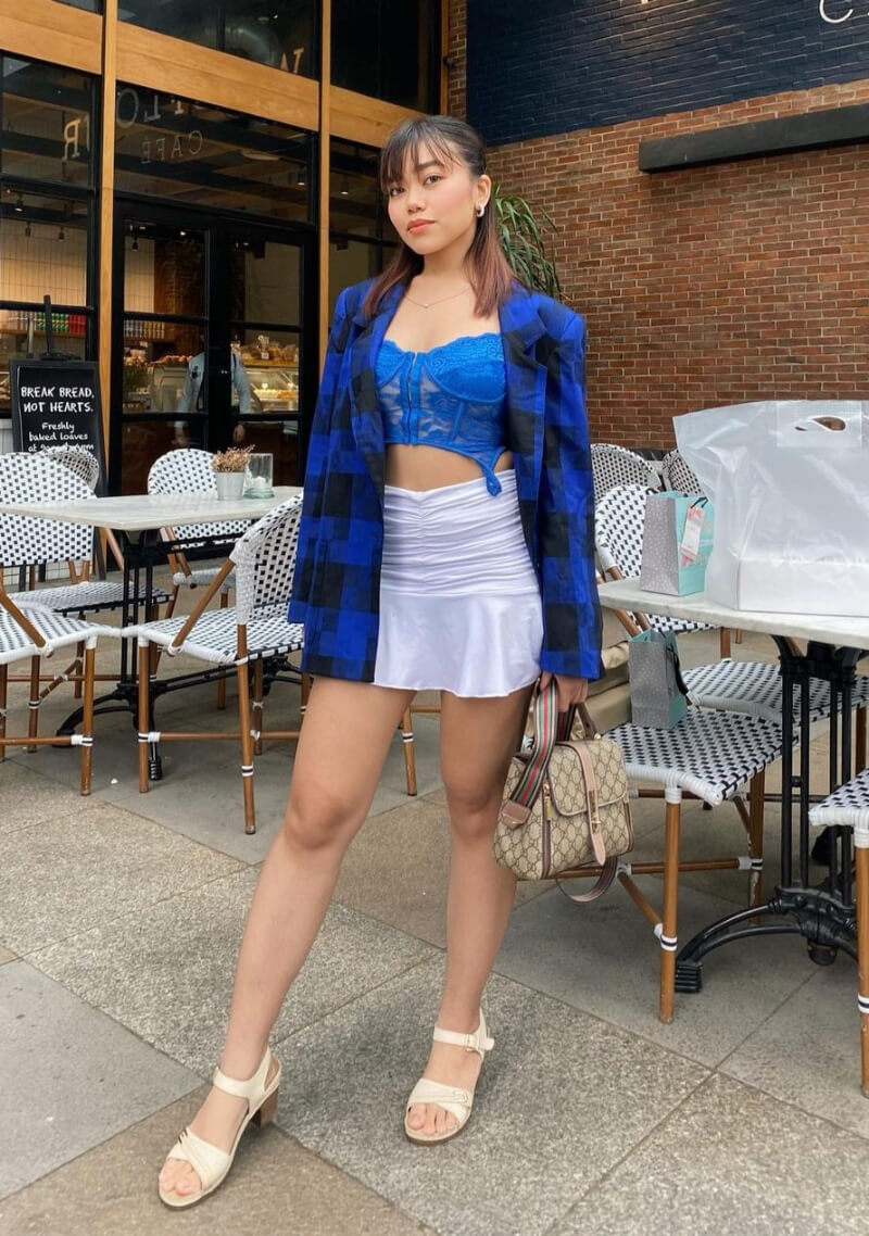 Pam Rose Reyes In Blue Checked Coat With Mini Skirt