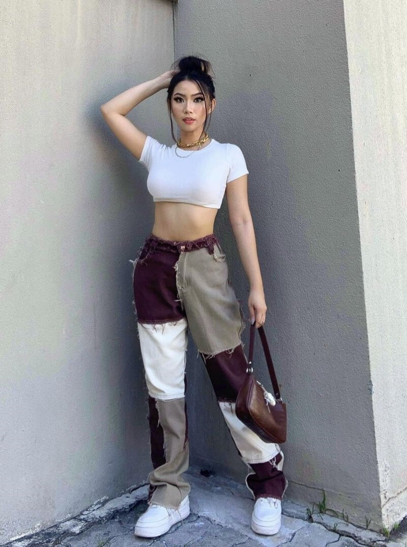 Rachelle Ruth In a White Crop Top With Checked Pants