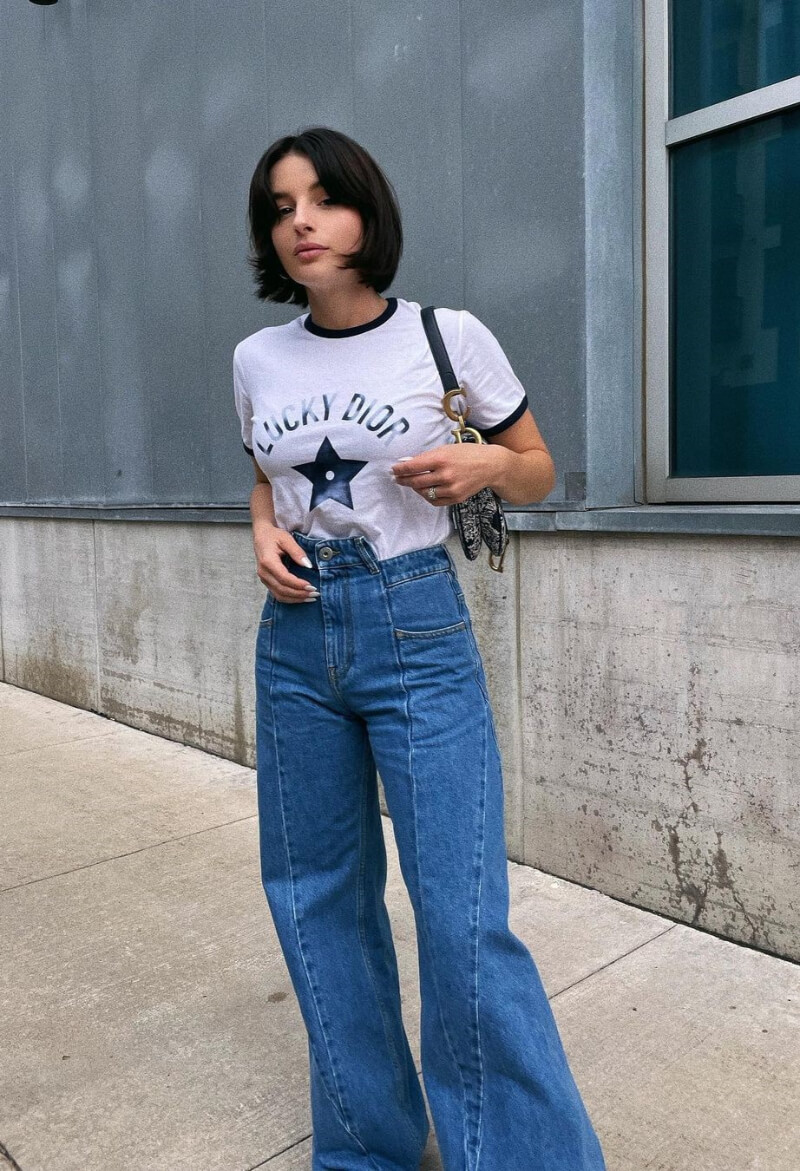 Taylor Hage In White T-shirt With Denim Bottoms
