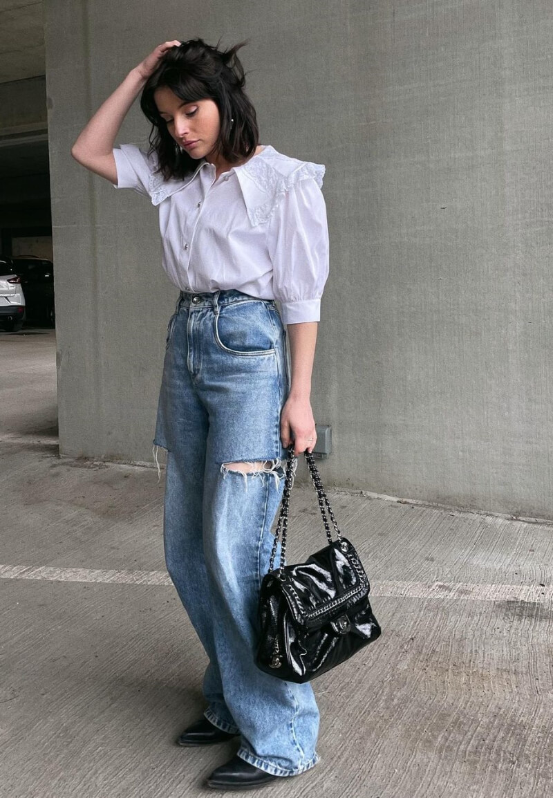 Taylor Hage In White Top With Ripped Jeans