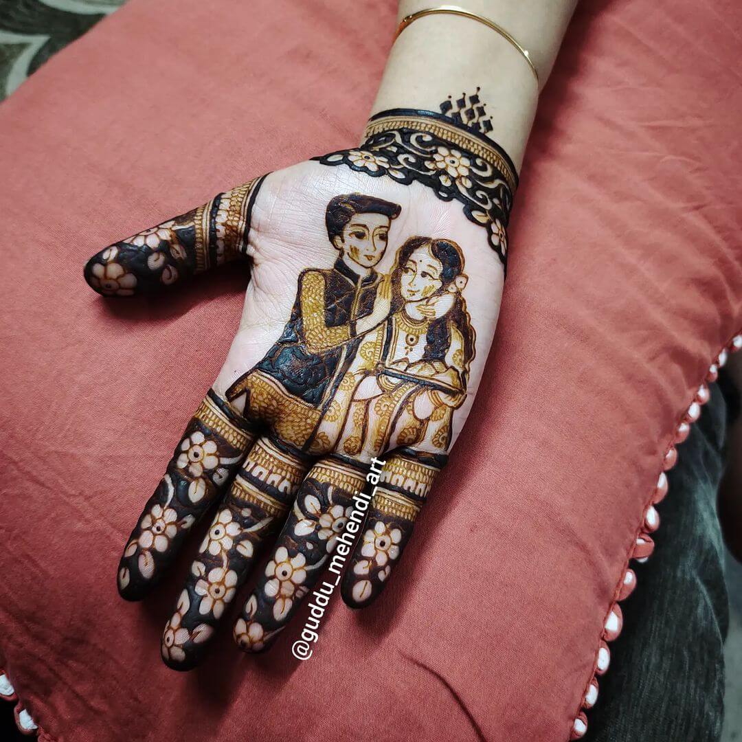 Adorable Intricate Floral & Couple Mehndi Design for Front Hand
