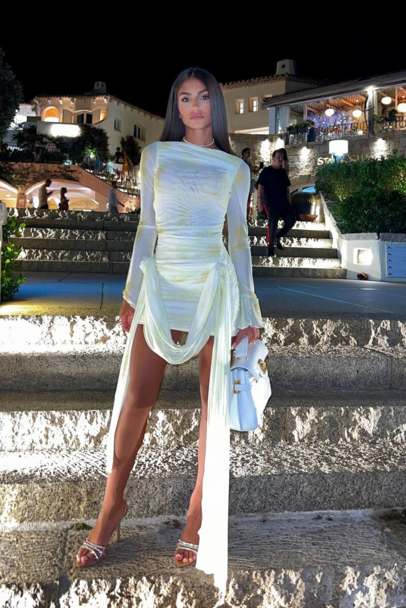Dalila Cascone In Shiny White Draping Style Short Dress