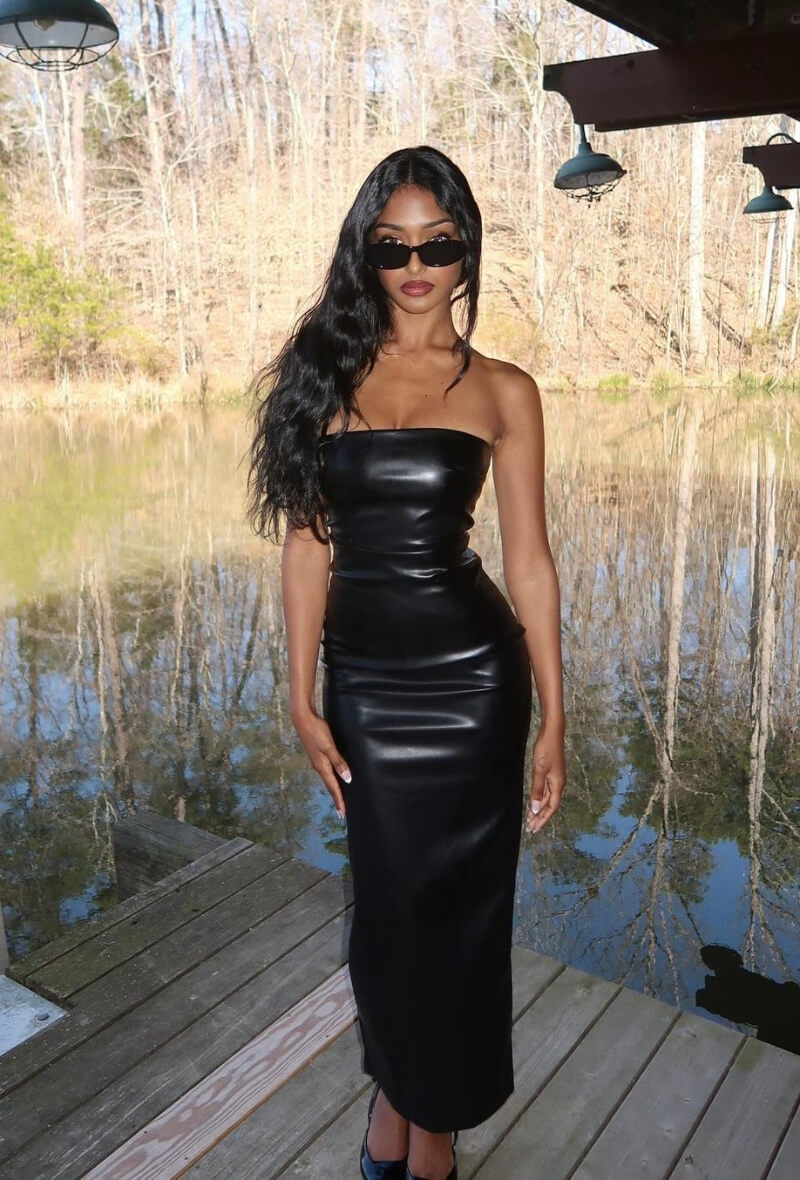 Kaaviya Hot In Black Leather Strapless Bodycon Dress