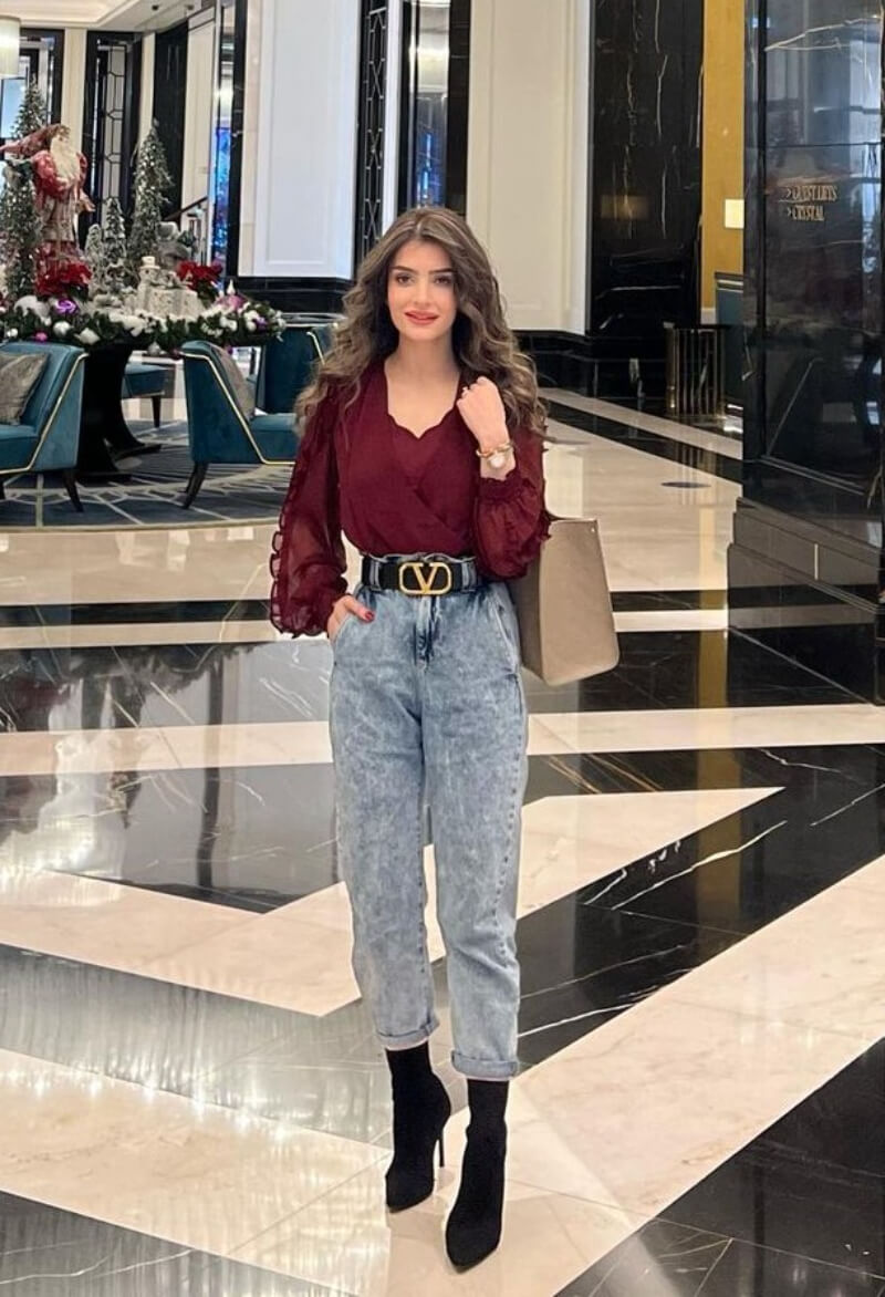 Shahad AlQaysi In Maroon Top With Jeans Outfit