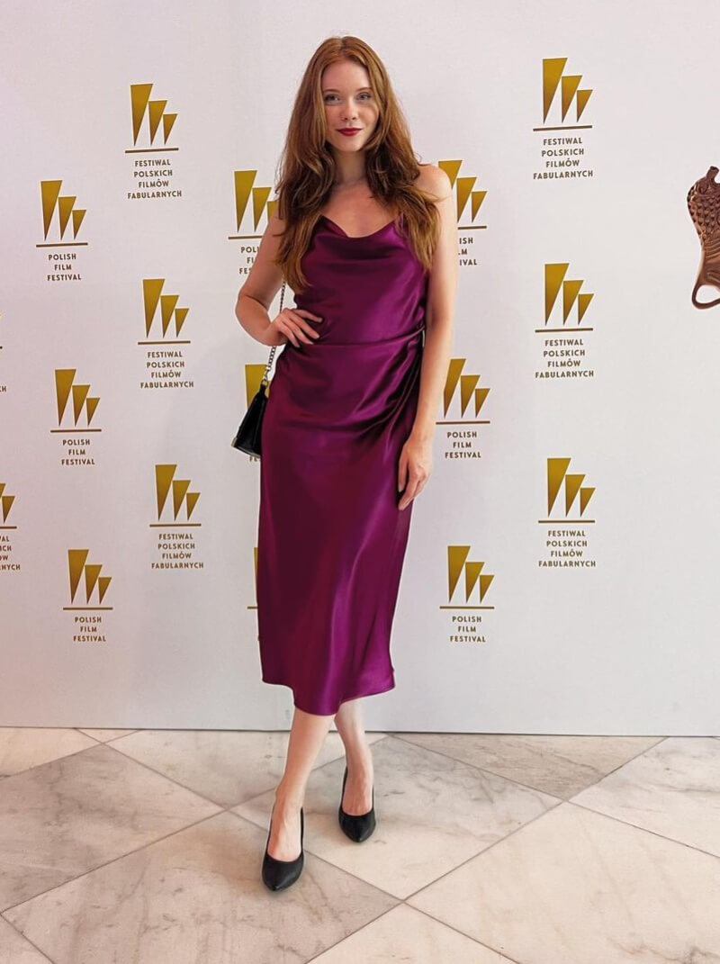 Sonia Trzewikowska In Shiny Purple Long Dress