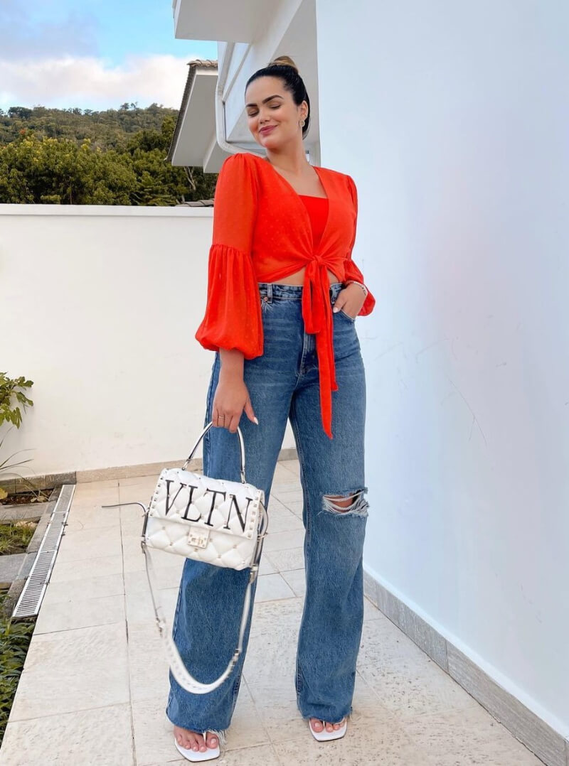 Suzanna Freitas In Orange Cami Top With Denim Bottoms