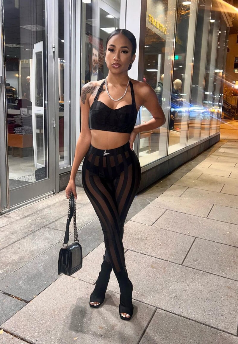 Araya Evans In Black Bralette Top With Striped Pants