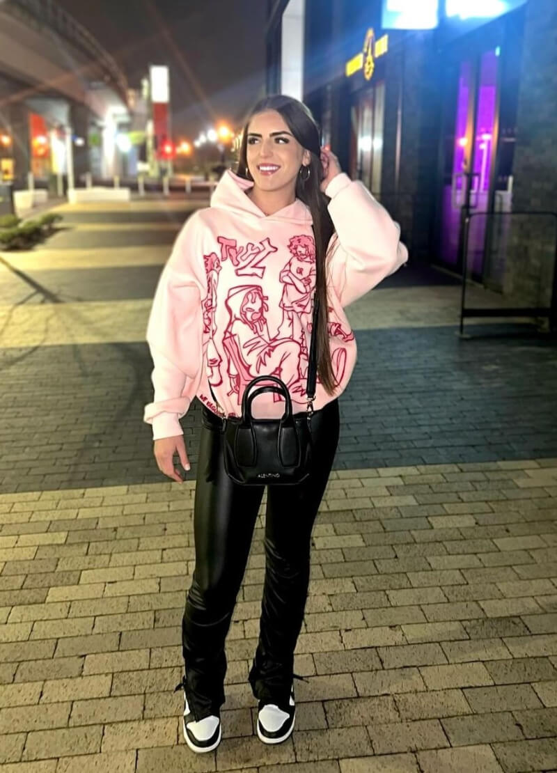 Charlotte Ruggeri Grant In Sweatshirt With Black Leather Pants