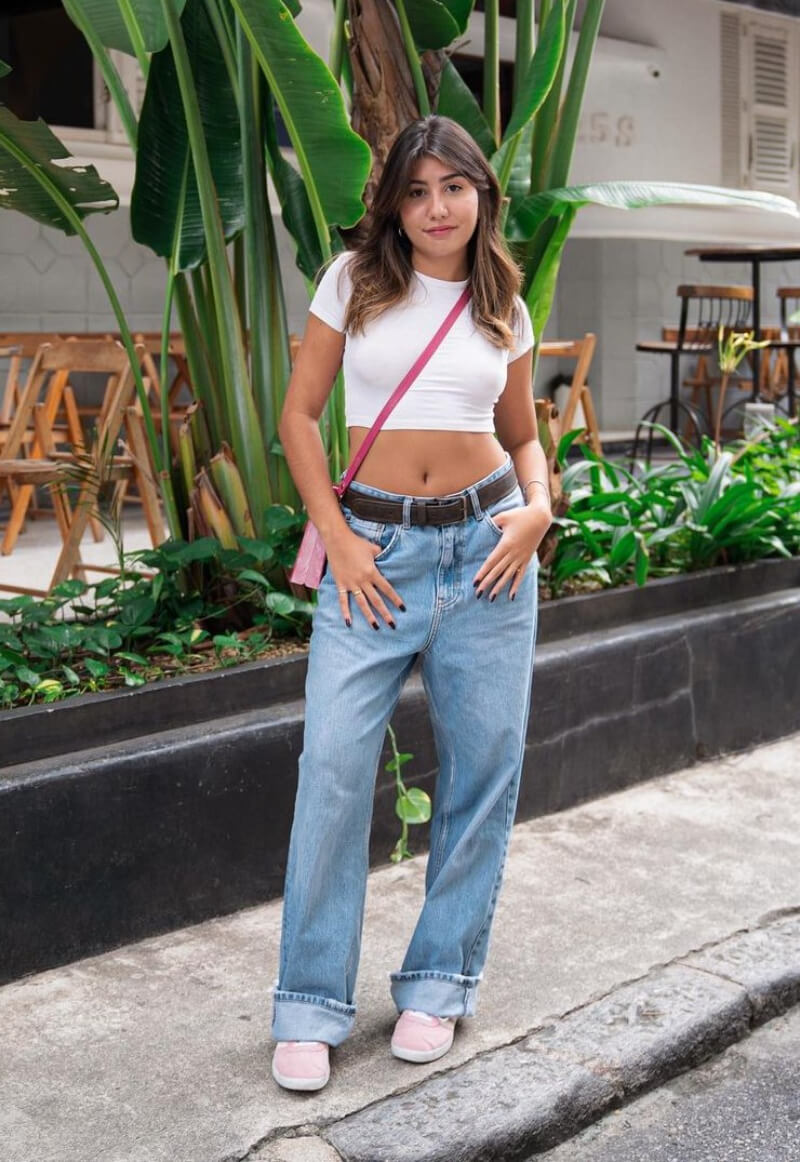 Lara Avellar In White Crop Top With Denim Jeans