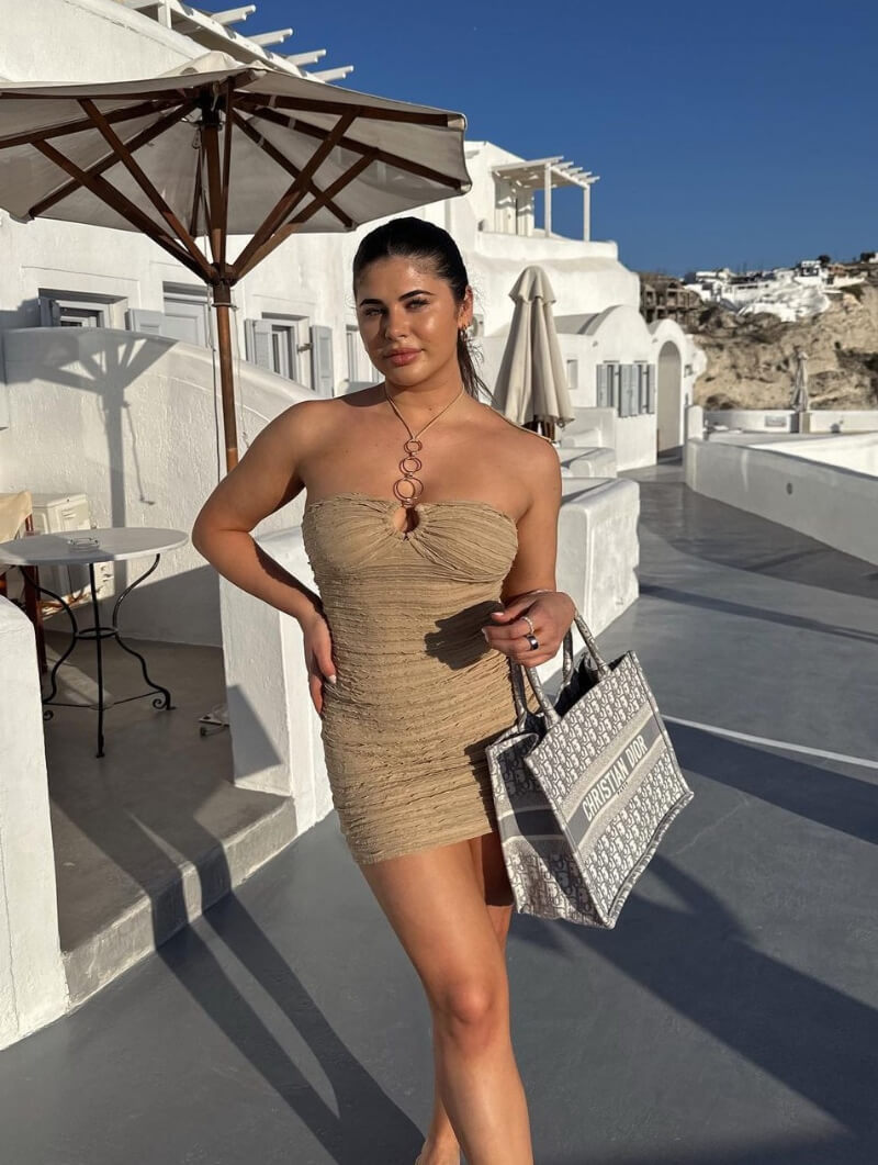 Elizabeth Fowler In Beige Strapless Mini Dress