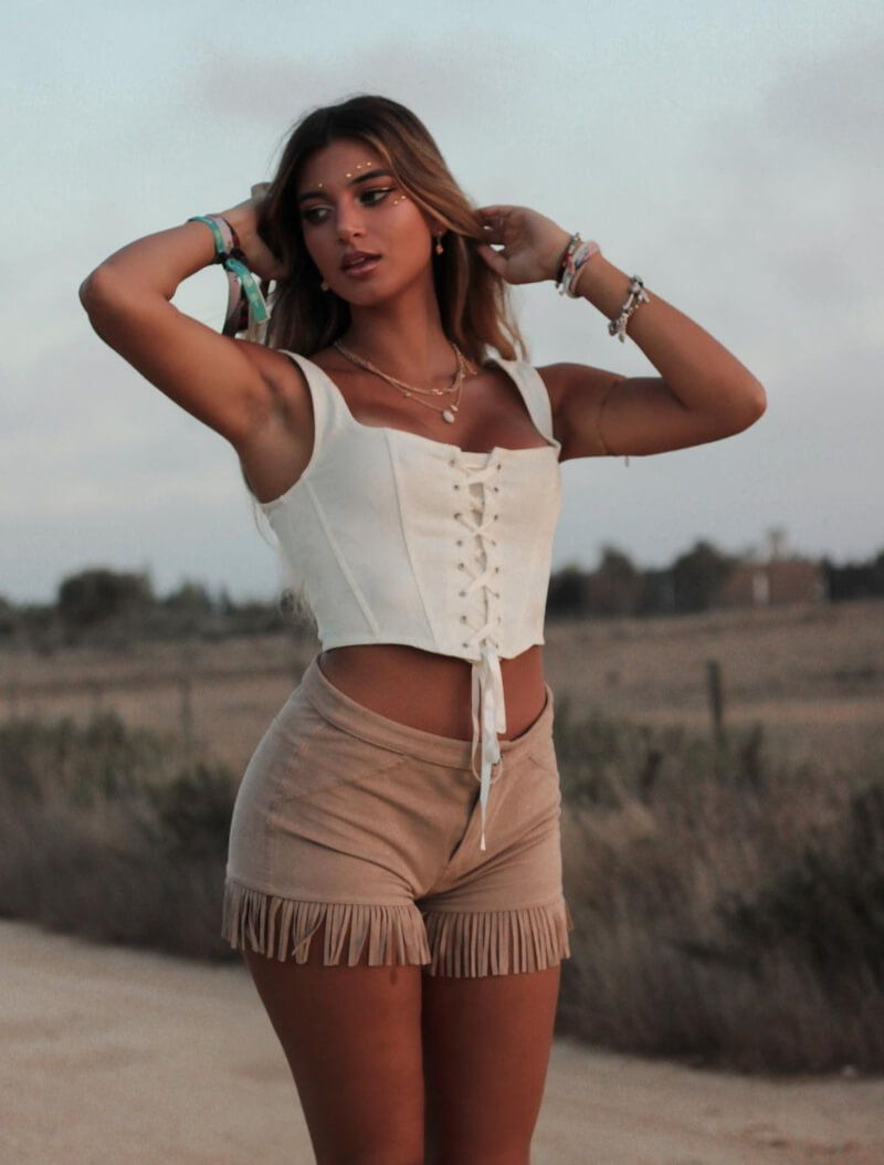 Rita Azeredo In Cream Crop Top With Fringe Shorts
