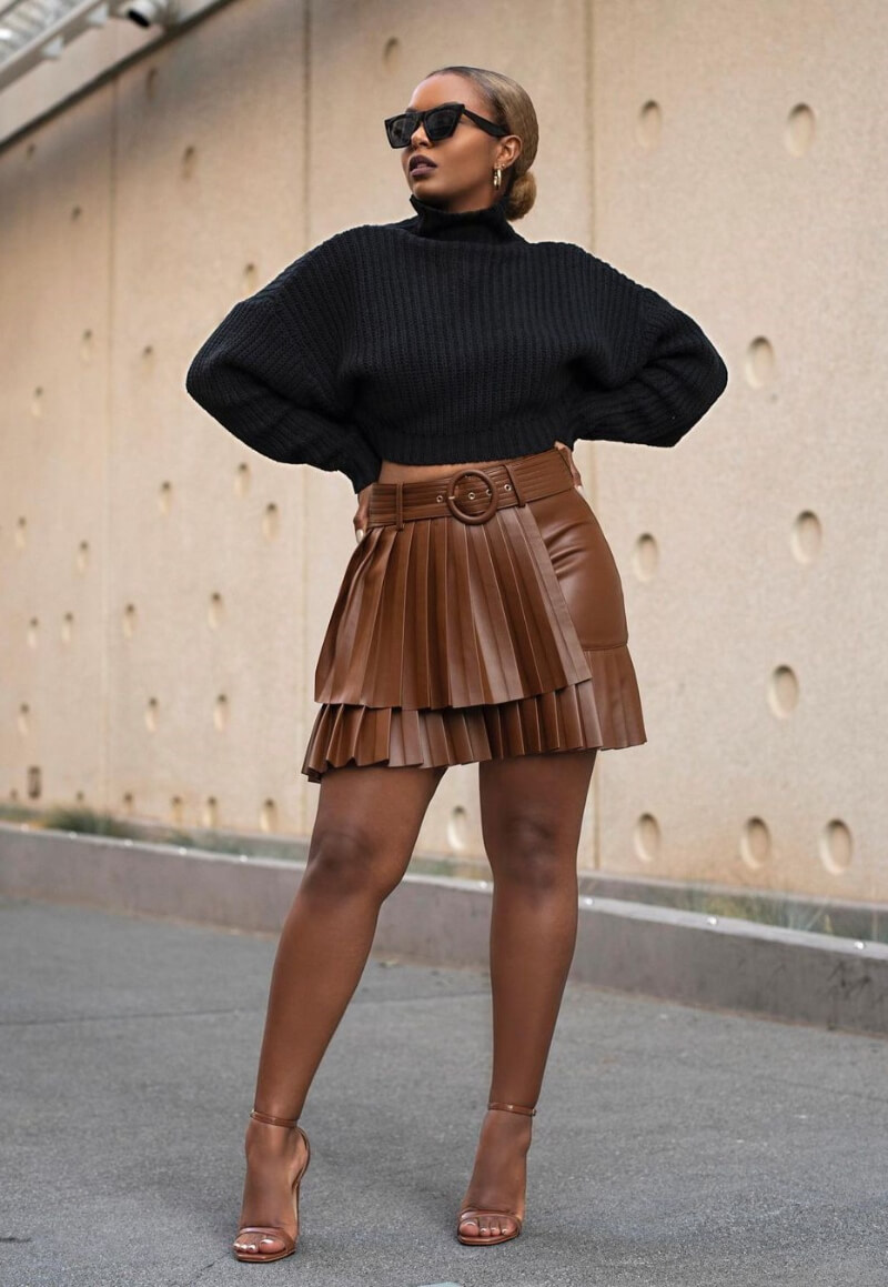 Tina Mengistu In Black Woven Baggy Top With Leather Mini Skirt