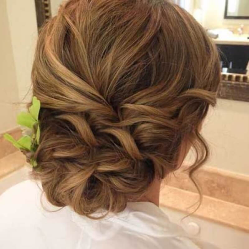 A Messy Curls Braids Hairstyle