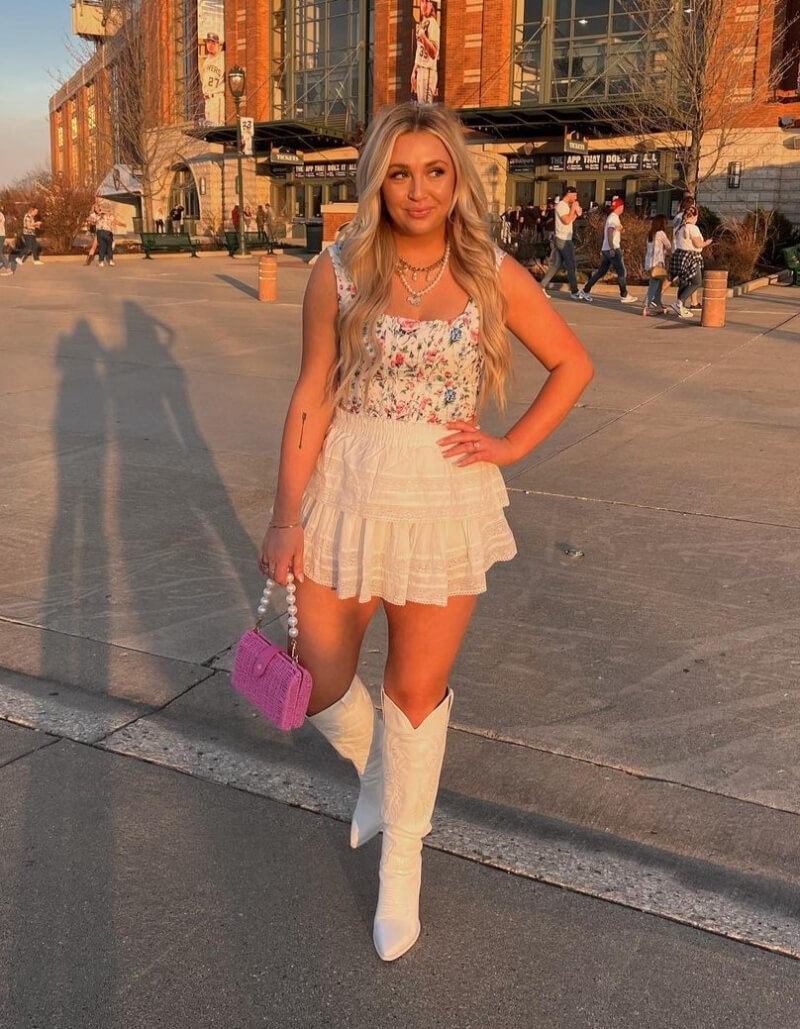 Brooke Anderson In Printed Top With Frill Mini Skirt