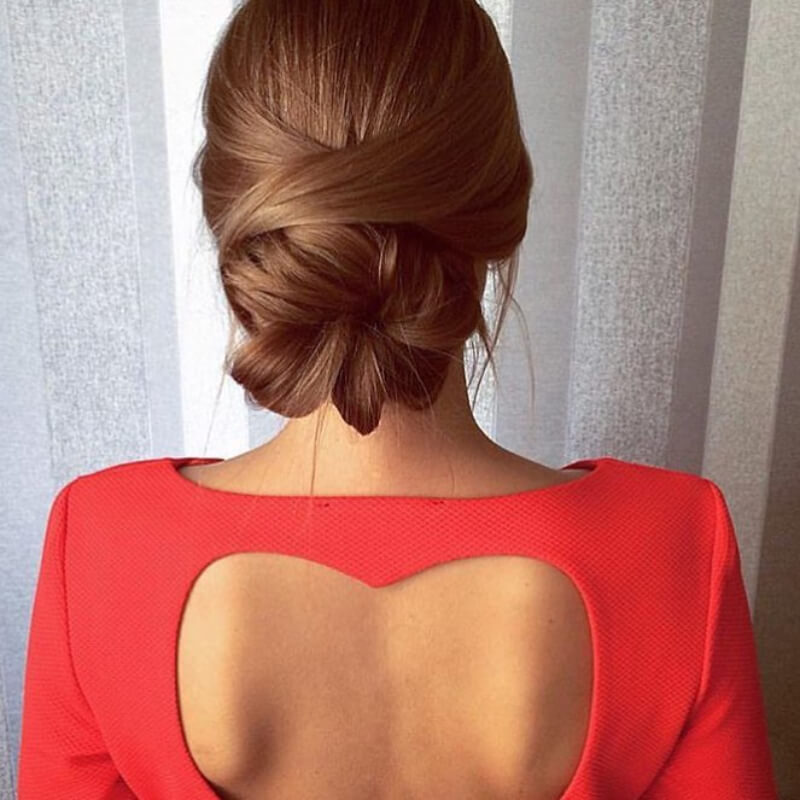 Elegant Wrapped Floral Bun Hairstyle