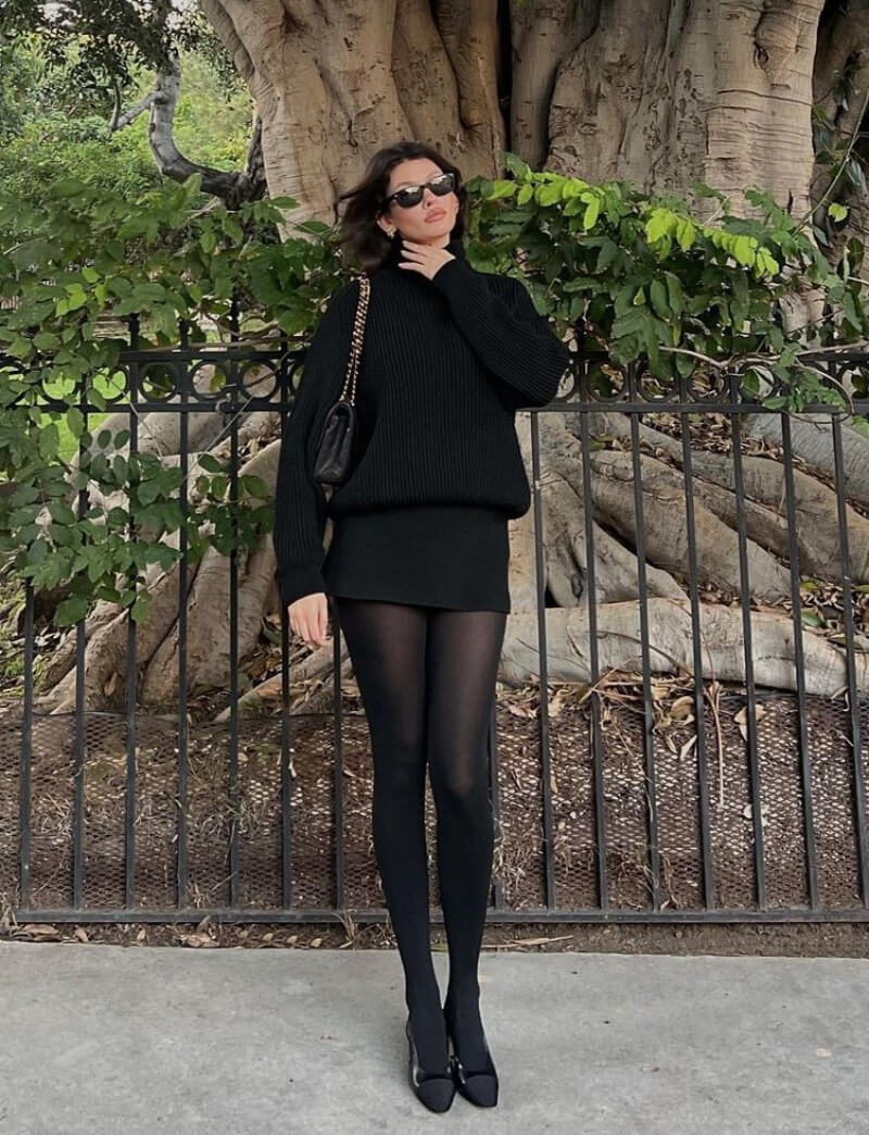 Madeleine Rose In Black Baggy Top With Mini Skirt