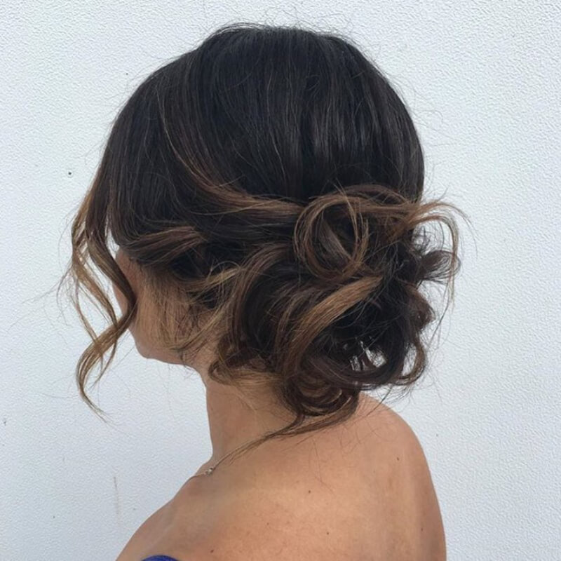 Pretty Messy Flicks Bun Hairstyle