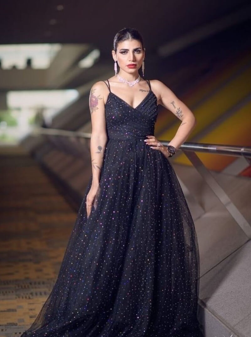 Rania Younis In Black Shimmery Strap Sleeves Long Flare Gown