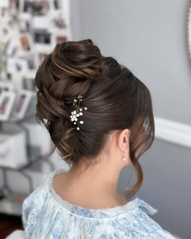 Top Wavy Tuck Bun Hairstyle